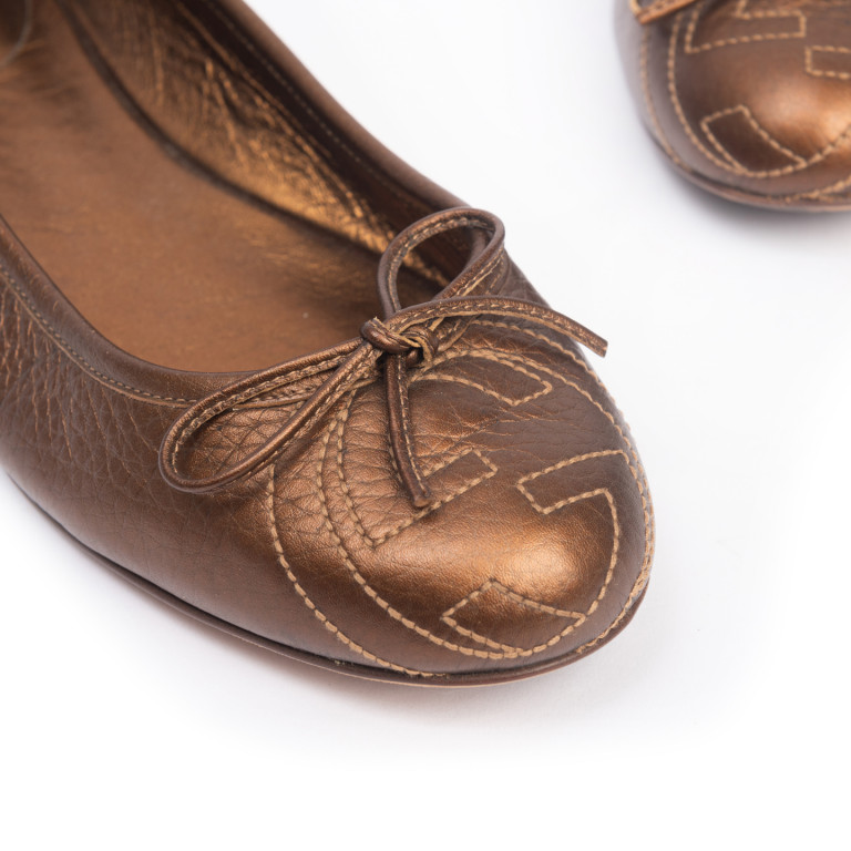 bronze ballet flats